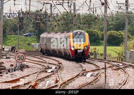 Virgin Voyager diesel train on the West Coast Main Line at Winwick junction. Stock Photo