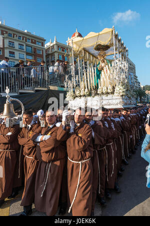 MALAGA,SPAIN-APRIL 09 2017:Unidentified people walking in the catholic processions called Semena Santa in Malaga on April 09 2017, this processions ar Stock Photo