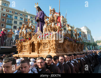 MALAGA,SPAIN-APRIL 09 2017:Unidentified people walking in the catholic processions called Semena Santa in Malaga on April 09 2017, this processions ar Stock Photo