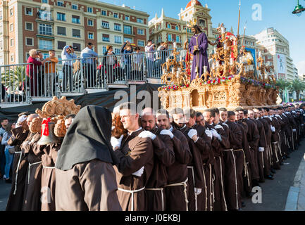 MALAGA,SPAIN-APRIL 09 2017:Unidentified people walking in the catholic processions called Semena Santa in Malaga on April 09 2017, this processions ar Stock Photo