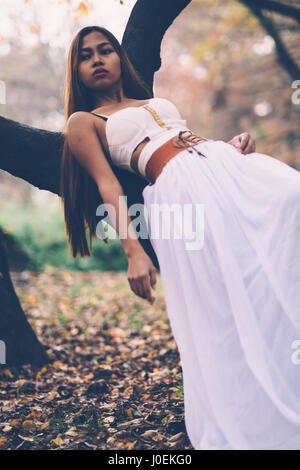 Portrait of beautiful wiccan girl in the forest Stock Photo