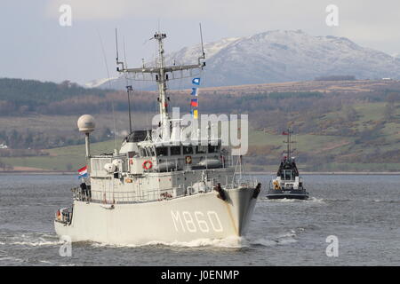 HNLMS Schiedam (M860) of the Netherlands Navy, passing Greenock on arrival for Exercise Joint Warrior 17-1, with the tug SD Jupiter in the background. Stock Photo