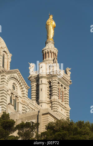 France, Marseille, Basilica Notre Dame de la Garde, belfry w statue of Virgin and child Stock Photo