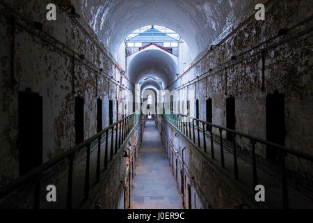 An abandoned cell block at the Eastern State Penitentiary in Philadelphia, Pennsylvania. Stock Photo