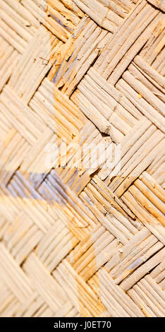 a wall build on wicker bamboo like abstract vintage surface Stock Photo