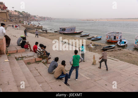 Children playing cricket on ghats, varanasi, uttar pradesh, india, asia Stock Photo