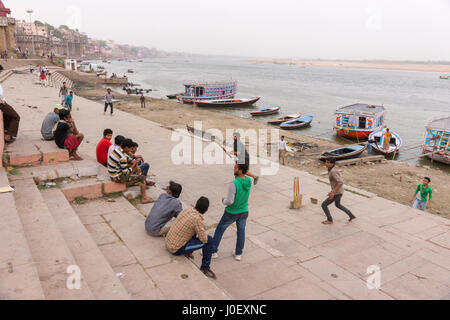 Children playing cricket on ghats, varanasi, uttar pradesh, india, asia Stock Photo