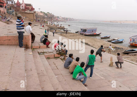 Children playing cricket on ghats, varanasi, uttar pradesh, india, asia Stock Photo