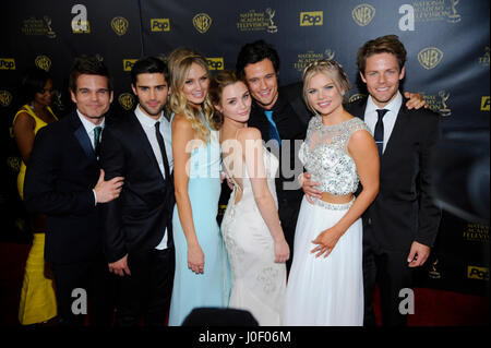 (L-R) Actors Max Ehrich, Melissa Ordway; Hunter King, Matthew Atkinson, Kelli Goss, and Lachlan Buchanan pose in the press room at The 42nd Annual Daytime Emmy Awards at Warner Bros. Studios on April 26th, 2015 in Burbank, California. Stock Photo