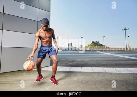 young man play basketball Stock Photo