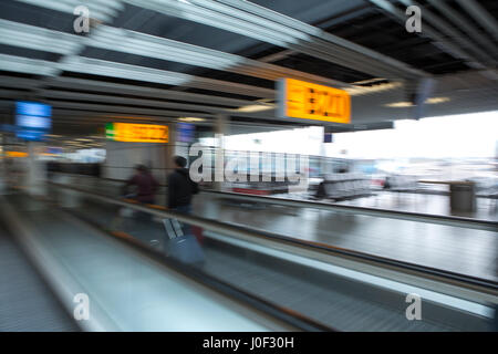 Rushing to the connecting flight through the airport Stock Photo