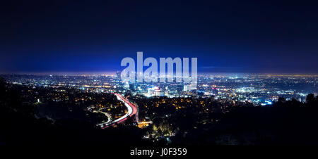 Los Angeles city skyline and highway 101 viewed from West Hollywood hills or heights Stock Photo