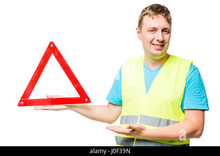 Happy mechanic demonstrates emergency stop sign on white background Stock Photo
