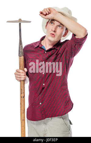 weary farmer with a hoe in the hat on a white background Stock Photo