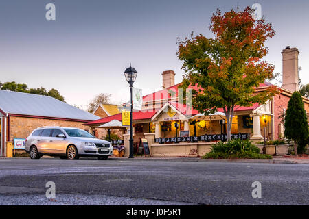 Hahndorf, South Australia - April 9, 2017: Main street views of Hahndorf in Adelaide Hills area with shops and cafes during autumn season after rain Stock Photo