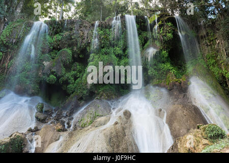 El Nicho Waterfalls in Cuba. El Nicho is located inside the Gran Parque Natural Topes de Collantes, a forested park that extends across the Sierra Esc Stock Photo