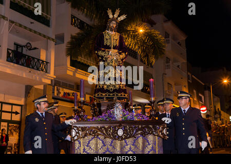 La Viña, Adeje, Tenerife. 10th April 2017. Easter procession with the assistance of the Local Police, Guardia Civil, National Police,the volunteer firemen, lifeguards, and music by the BRILCAN Army Nº2 Band, and the Adeje Patron Municipal band, through the streets of this area of Adeje, Tenerife, Canary Islands, Spain. Stock Photo