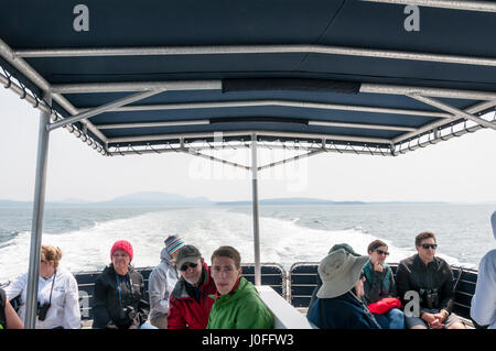 Tourists on a whale watching trip from Friday Harbor in the San Juan Islands, Washington, USA Stock Photo