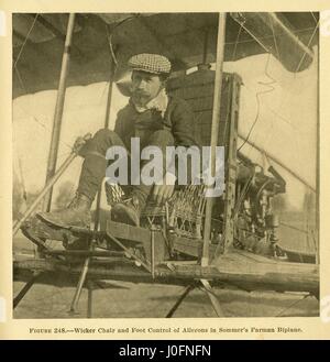Wicker chair and foot control of ailerons in Sommer's Farman biplane, designed by Roger Sommer Stock Photo