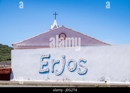 Villlage name of Erjos spelt out in mosaic tiling on a wall next to the church, Tenerife, Canary Islands, Spain Stock Photo