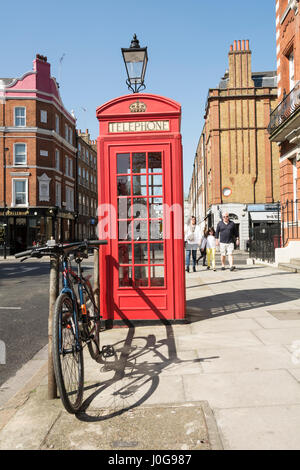 A red phone box on Bedford Row in Bloomsbury, London, UK Stock Photo