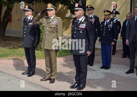Gen. Tullio Del Sette, Italian Carabinieri General Commander (left), Gen. Claudio Graziano, Italian Army Chief of Staff (center) and Brig. Gen. Giovanni Pietro Barbano, Center of Excellence for Stability Police Units (CoESPU) director (left), receive salute of honor at the end of visit at Center of Excellence for Stability Police Units (CoESPU) Vicenza, Italy, April 1, 2017. (U.S. Army Photo by Visual Information Specialist Antonio Bedin/released)