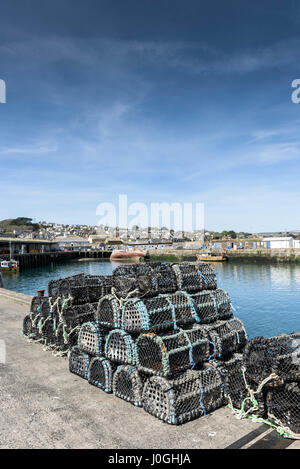 Newlyn Fishing Port Lobster pots Quayside Harbour Harbor Fishing industry Coast Coastal scene Cornwall Stock Photo