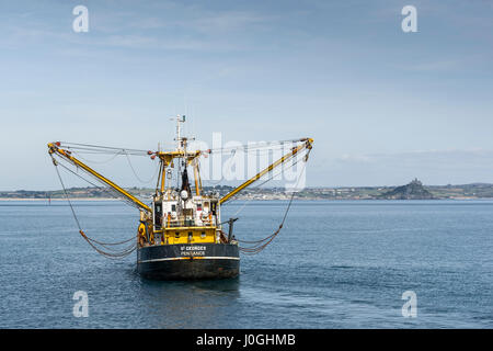 Beam trawler Leaving harbour Fishing vessel Fishing boat Fishing industry Starting fishing trip PZ1052 St Georges Sea Coast Newlyn Coastal Scene Stock Photo