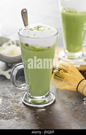 Matcha coconut latte in tall glasses Stock Photo