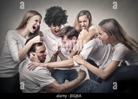 Group of people fighting Stock Photo