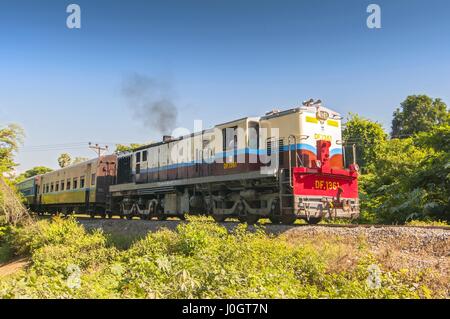 An extremely slow Myanmar Rail passenger train near Inle Lake in Shan state, Myanmar Stock Photo