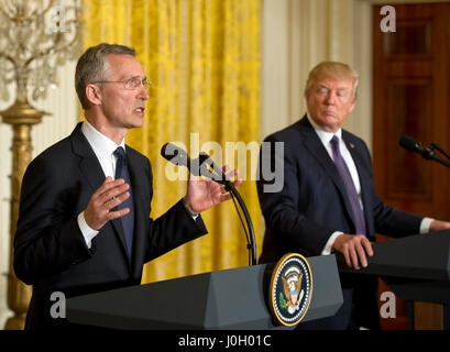 Washington DC, USA. 12th Apr, 2017. United States President Donald J. Trump and Secretary General Jens Stoltenberg of NATO conduct a joint press conference in the East Room of the White House in Washington, DC on Wednesday, April 12, 2017. Credit: Ron Sachs/CNP /MediaPunch Credit: MediaPunch Inc/Alamy Live News Stock Photo