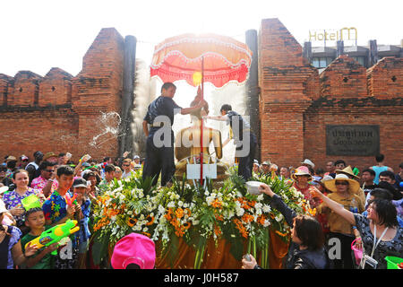 Chiang Mai, Thailand. 13th April 2017. The first day of Songkran, the Thai New Year, started with a massive water fight in Chiang Mai, which will last for three days. The tradition comes from pouring a small amount of water on a statue of Buddha, or monks, to receive a blessing in return. Now the blessings flow freely and rather than a small sprinkle of water, can be administered by hose, bucket of even super soaker water pistols. Credit: Paul Brown/Alamy Live News Stock Photo