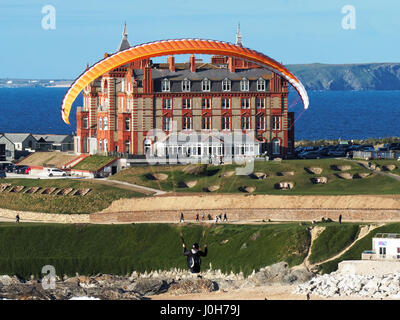 Newquay, UK, 13th April,  2017, Paragliders frame the Headland hotel at Fistral Bay Newquay Robert Buchanan Taylor/Alamy Live news. Stock Photo