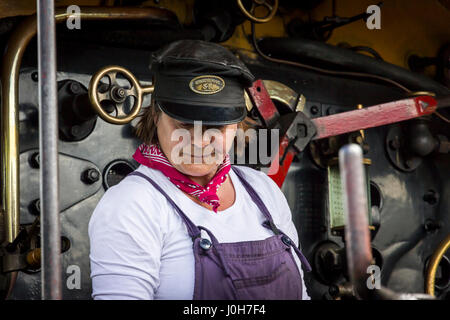 Female locomotive driver at the Bluebell Railway Horsted Keynes Sussex ...