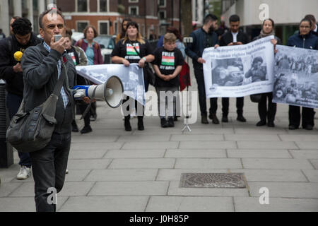London, UK. 13th April, 2017. A speaker from the Workers Communist Party of Kurdistan addresses members of the UK's Iraqi community and supporters attending an emergency demonstration organised by the International Federation of Iraqi Refugees to protest against the detention of 30 Iraqi refugees during the past week, believed to be in preparation for a mass deportation charter flight to Iraq. Stock Photo