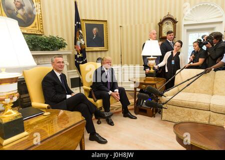 U.S President Donald Trump and NATO Secretary General Jens Stoltenberg prior to their bilateral meeting in the Oval Office of the White House April 12, 2017 in Washington, DC. Stock Photo