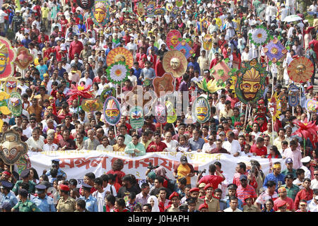 Dhaka, Bangladesh. 14th Apr, 2017. Bangladeshi people attend a rally in celebration of the Bengali New Year or Pohela Boishakh in Dhaka, Bangladesh, April 14, 2017. The Bengali calendar or Bangla calendar is a traditional solar calendar and the year begins on Pohela Boishakh, which falls on April 14 in Bangladesh. Credit: Suvra Kanti Das/ZUMA Wire/Alamy Live News Stock Photo