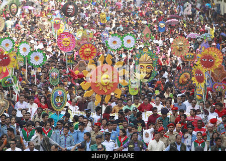 Dhaka, Bangladesh. 14th Apr, 2017. Bangladeshi people attend a rally in celebration of the Bengali New Year or Pohela Boishakh in Dhaka, Bangladesh, April 14, 2017. The Bengali calendar or Bangla calendar is a traditional solar calendar and the year begins on Pohela Boishakh, which falls on April 14 in Bangladesh. Credit: Suvra Kanti Das/ZUMA Wire/Alamy Live News Stock Photo