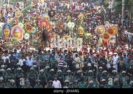 Dhaka, Bangladesh. 14th Apr, 2017. Bangladeshi people attend a rally in celebration of the Bengali New Year or Pohela Boishakh in Dhaka, Bangladesh, April 14, 2017. The Bengali calendar or Bangla calendar is a traditional solar calendar and the year begins on Pohela Boishakh, which falls on April 14 in Bangladesh. Credit: Suvra Kanti Das/ZUMA Wire/Alamy Live News Stock Photo