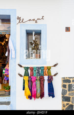 Detail of colourful scarves on a wall outside a shop in Cadaques, Catalonia, Spain Stock Photo