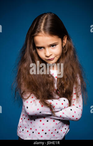 beautiful little girl with curls, being sad Stock Photo