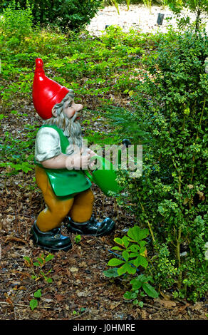 A colourful gnome in ' The Fairy Garden' Stock Photo