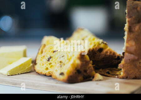 Slices of Panettone and Butter Stock Photo