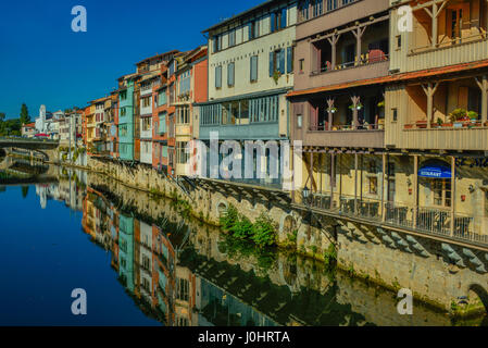 Period houses along the Agout river in Castres, Occitanie, France.
