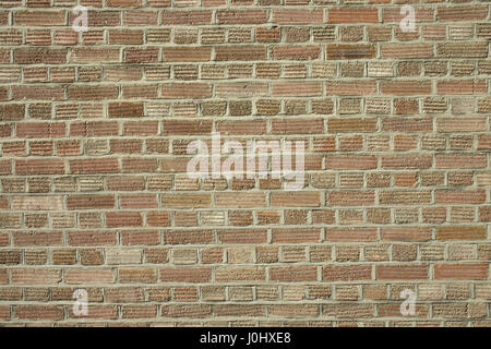 Brick wall construction demonstrating one of a number of brick wall types in red yellow brown and white Stock Photo