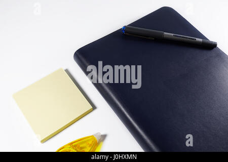 Notebooks, memory note, correction pen, pen isolated white background Stock Photo