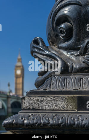 One of the ornate Dolphin lamp standards that provide electric light along much of the Thames Embankment in London, England. Stock Photo