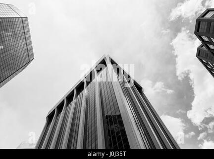 Denver, USA - May 25, 2016: Looking up a skyscraper belonging to the World Trade Center and the Colorado State Bank and Trust building in the financia Stock Photo