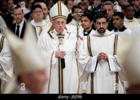 Pope Francis leaves at the end of the Chrism Mass for Holy Thursday (Maundy Thursday) which marks the start of Easter celebrations in St. Peter's Basilica in Vatican City, Vatican. The Chrism Mass is the traditional liturgy, during the course of which the oils to be used in the sacraments of initiation, Holy Orders and healing throughout the coming year are blessed. (Photo by Giuseppe Ciccia / Pacific Press) Stock Photo